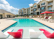 Thumbnail 18 of 37 - Poolside Sundeck at Aventura at Maryland Oaks, Missouri,63146