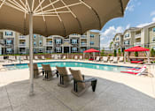Thumbnail 2 of 37 - Shaded Lounge Area by Pool at Aventura at Maryland Oaks, St. Louis, 63146