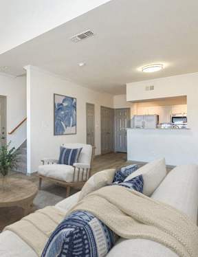 a living room with a fireplace and a couch