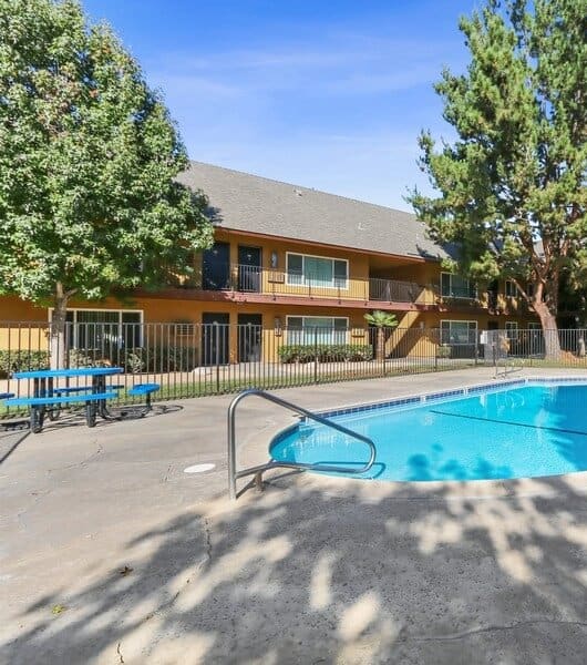 the swimming pool at the villas at stone creek
