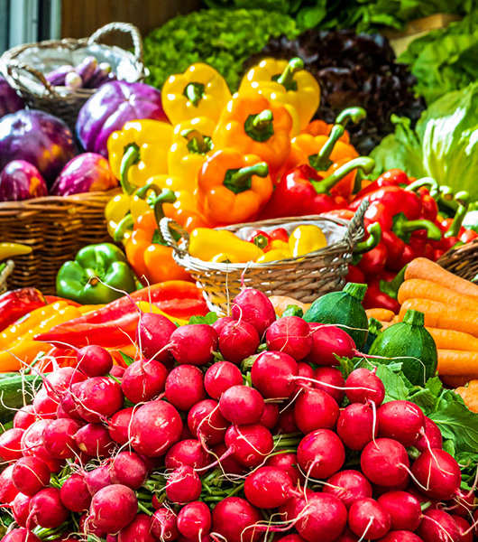 a display of vegetables at a farmers market