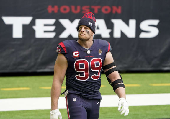 football player walks on the field during a game