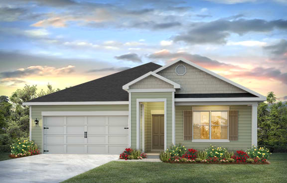a house with a garage door and a cloudy sky in the background