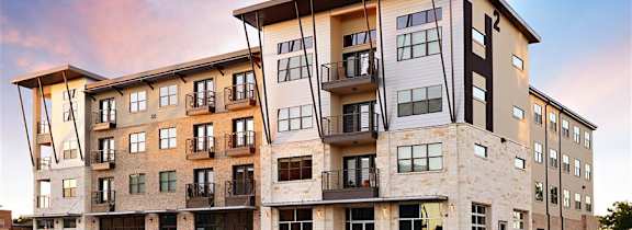 Apartments with a balcony and a covered entrance Apartments with a balcony and a covered entrance at H Squared Apartments, Denton, TX, 76201