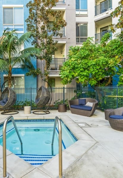 friends laughing at Enclave at Warner Center Apartments