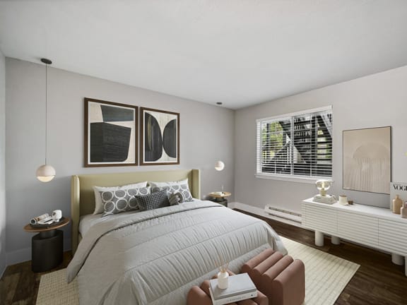 Model Bedroom with Wood-Style Flooring and Window View at Central Flats Apartments in Kent, WA.