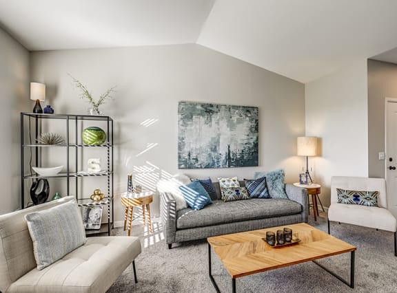 a living room with a couch and a coffee table at BELLA SONOMA, Fife, WA