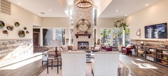 Sutter Ridge Clubhouse with view of fireplace and TV
