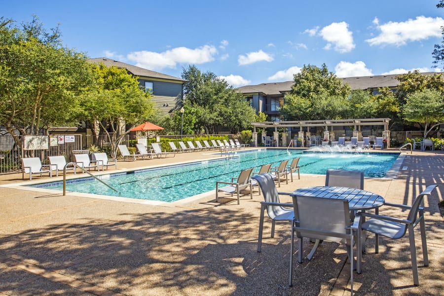 Abelia Flats poolside shaded dining area - Austin, TX