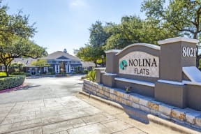 Nolina Flats monument sign at entrance