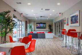 Seating area with TV l The Parc at Pruneyard Apartments