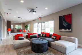 Large couch near kitchen area l The Parc at Pruneyard Apartments