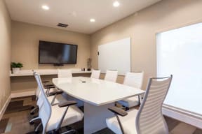 Campbell CA Apartments-Parc at Pruneyard Meeting Room with Round Conference Table and TV