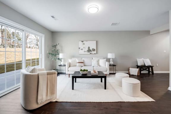 a living room with a couch and a table at Pleasant View Estates, Griswold, Connecticut