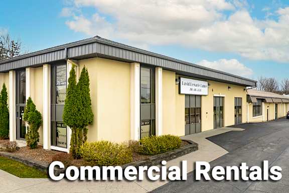A building with the words Commercial Rentals on it.
