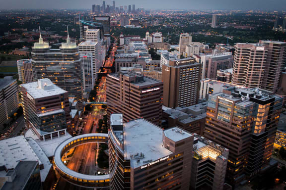 a city from the top of a skyscraper