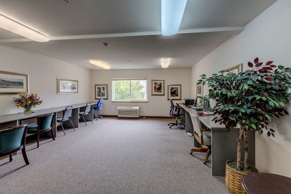 Room with tables and chairs at VINTAGE AT BURIEN, Washington