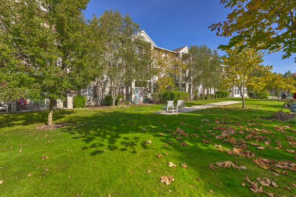 Grass area and Building at VINTAGE AT Sequim Apartments, Sequim 