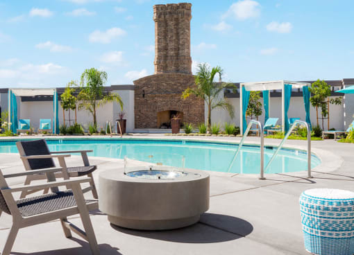 Apartments in Rocklin CA - The James - Pool Area with Firepit, Cabanas, and Landscaping