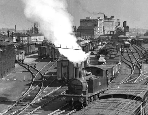a black and white photo of a train