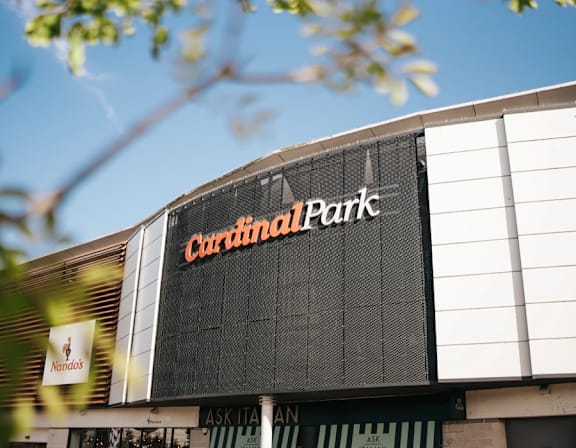 the sign for central park on the side of a building