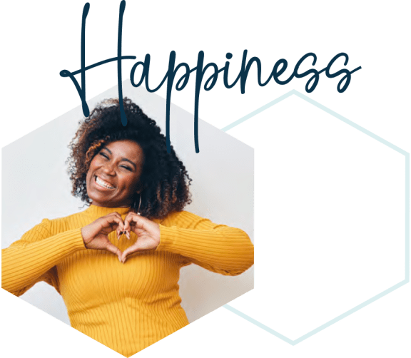 a woman smiling and making a heart shape with her hands