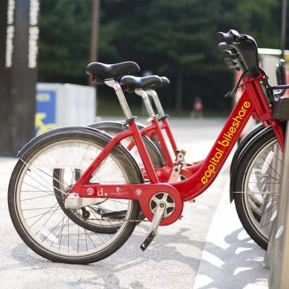 a red bike parked next to another bike at Fort Totten Square, Washington, Washington DC
