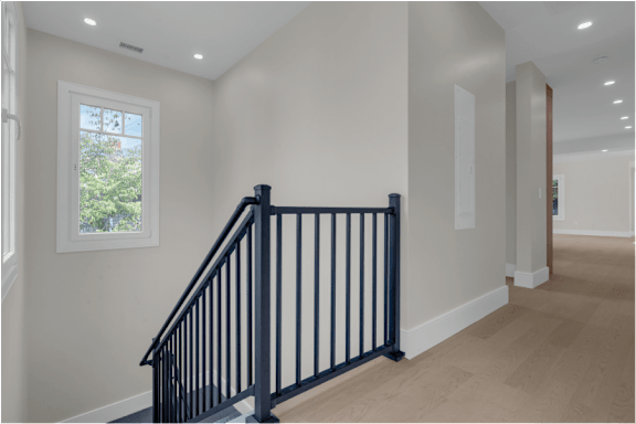 the view from the bottom of a staircase in a new home