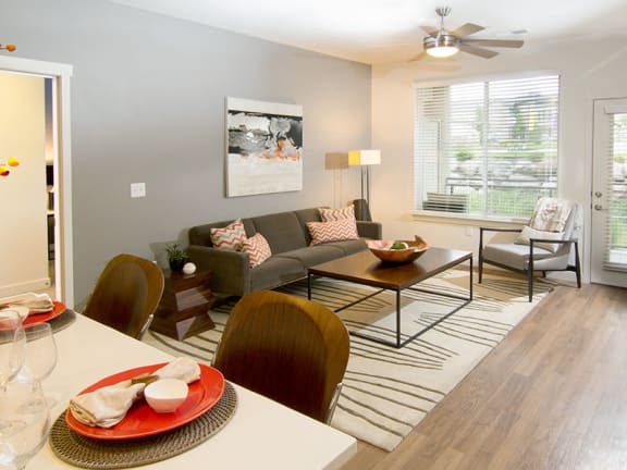 Open Living Room with Ceiling Fan at Lofts at 7800 Apartments, Midvale, UT