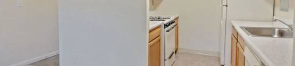 Open kitchen with a dishwasher at Broadfalls in Falls Church, VA
