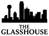 A black and white image of a city skyline with the words "The Glasshouse" written below it.