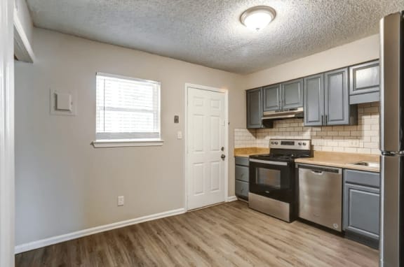 Kitchen and living room with lights at Greenwood Village, North Carolina
