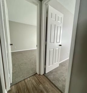 an open door leading into an empty room