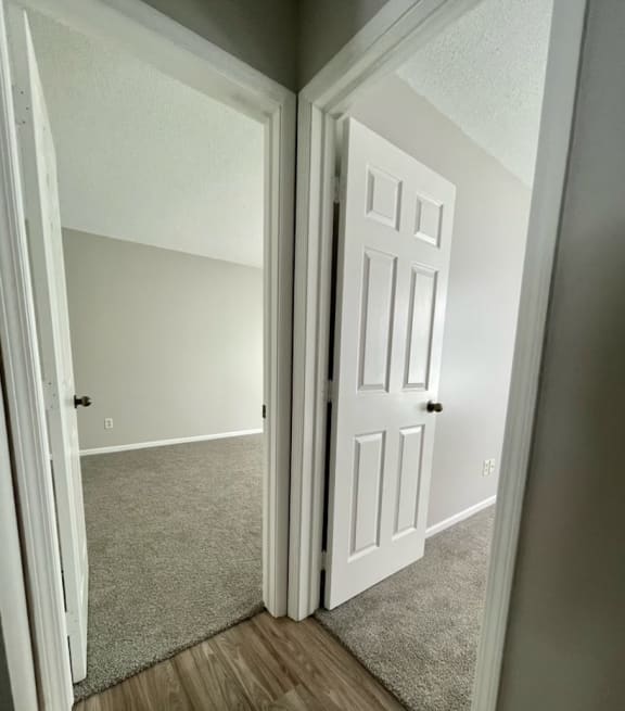 an open door leading into an empty room