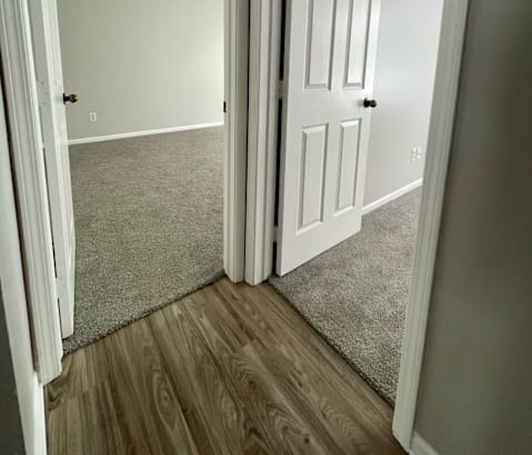 an open door leading into an empty room