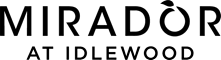 The image shows a logo with the text "MIRADOR AT IDELEWOOD" and a stylized apple with a green leaf.