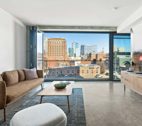 Reverb Apartments Model Living Room with Beautiful City View