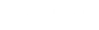 A green sign with the words "MAC & MULLEN BY DEVERAUX" written on it.