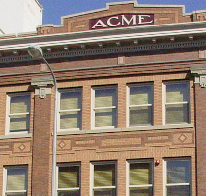A building with the letters ACME on top of it.