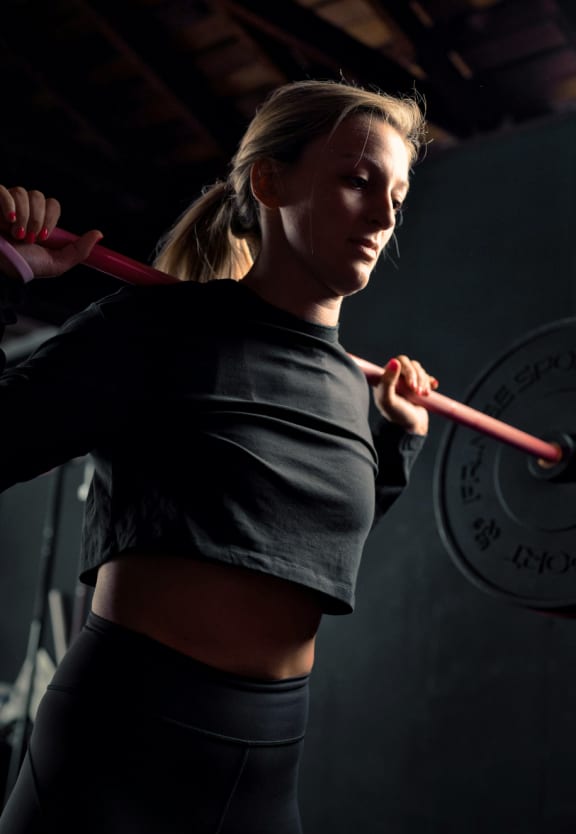 Woman Working Out in Gym