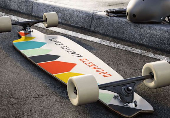 a skateboard laying on the ground next to some steps