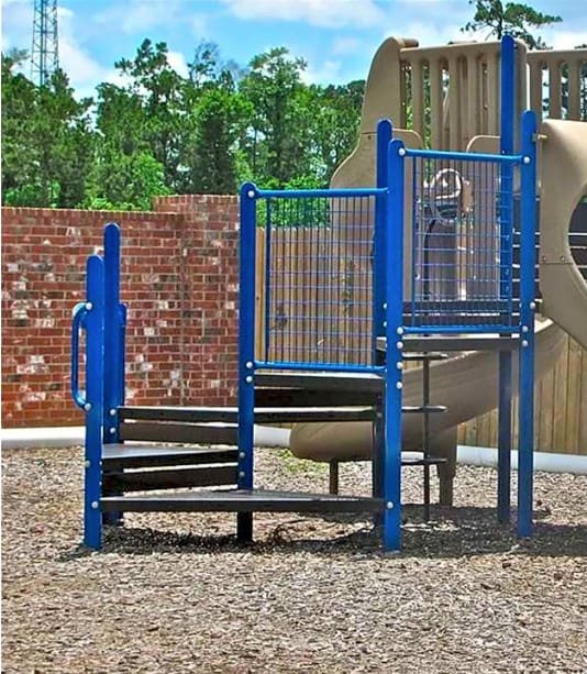 a playground with a slide and monkey bars