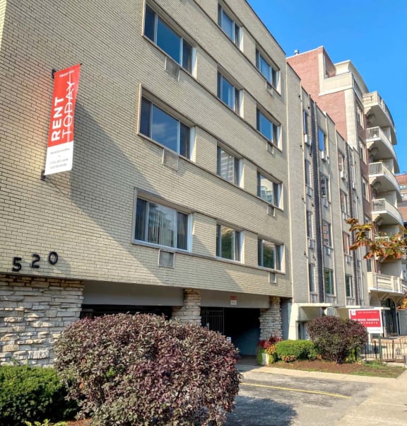 a building with a red sign on the side of it