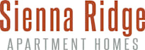 A brown and white sign that says Sienna Ridge Apartment Homes.