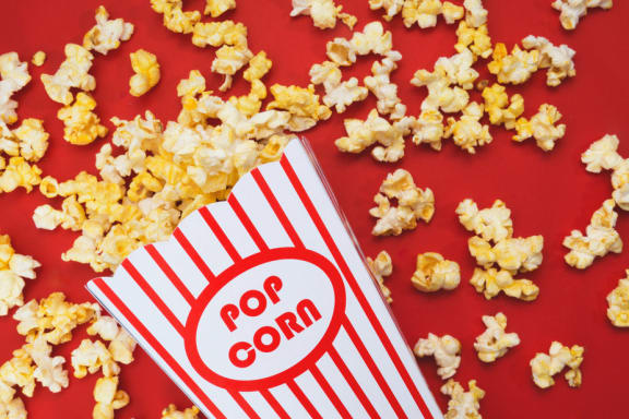 Movie theater popcorn against red backdrop at Mirabella Apartments, Bermuda Dunes, California