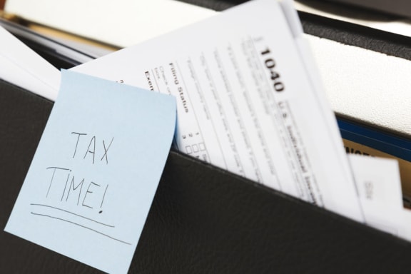 Tax Time Reminder and Paperwork at Mirabella Apartments, California, 92203