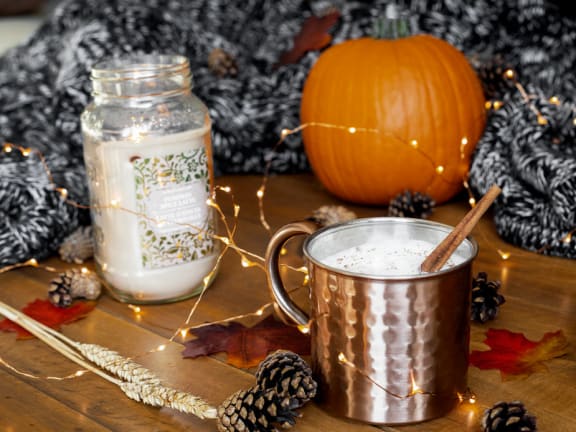 Pumpkin spice drink and candle on table at Mirabella Apartments, Bermuda Dunes, CA