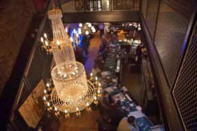 an overhead view of a restaurant with a large chandelier