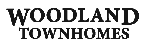 The image displays the words "WOODLAND TOWNHOMES" in large, bold letters.