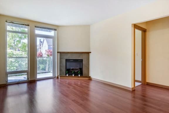 Living Area with Fireplace at 128 on State in WA 98033